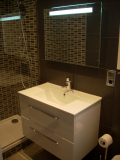 Mueble lavabo gris reforma Eixample. Barcelona